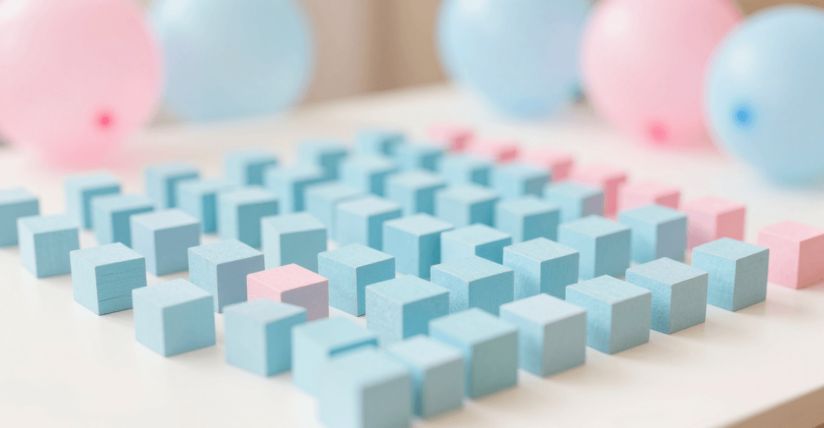 Cubos de madeira azul claro e rosa organizados em grade sobre mesa branca, lembrando um calendário de disponibilidade, com balões desfocados ao fundo.